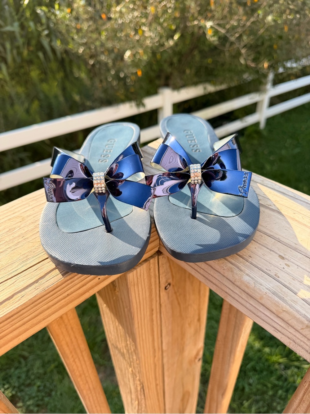 Guess Women’s Navy Blue Bow Thong Sandals with Rhinestone Detail
